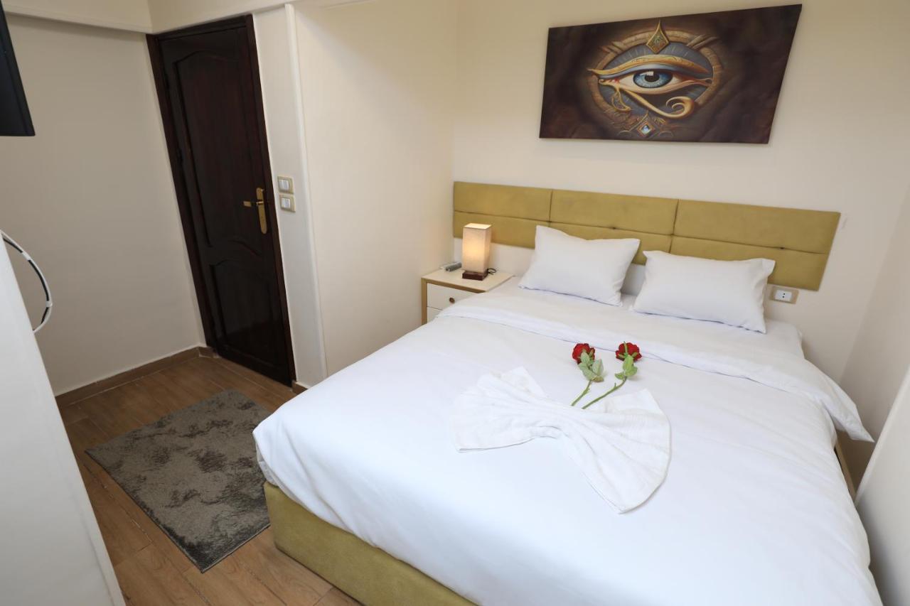 Pyramids Heart Hotel Kafrat al Jabal Bagian luar foto
