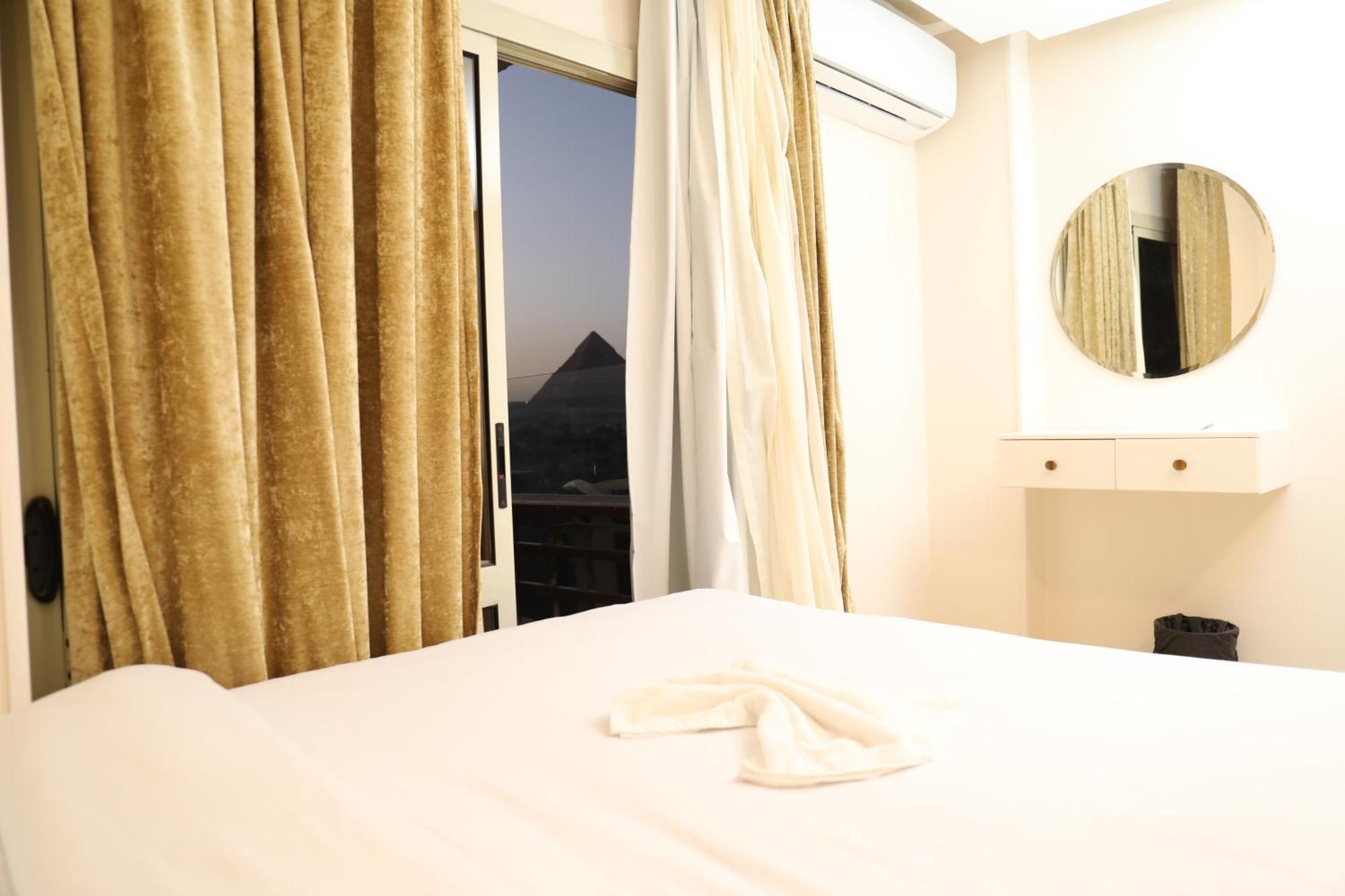 Pyramids Heart Hotel Kafrat al Jabal Bagian luar foto