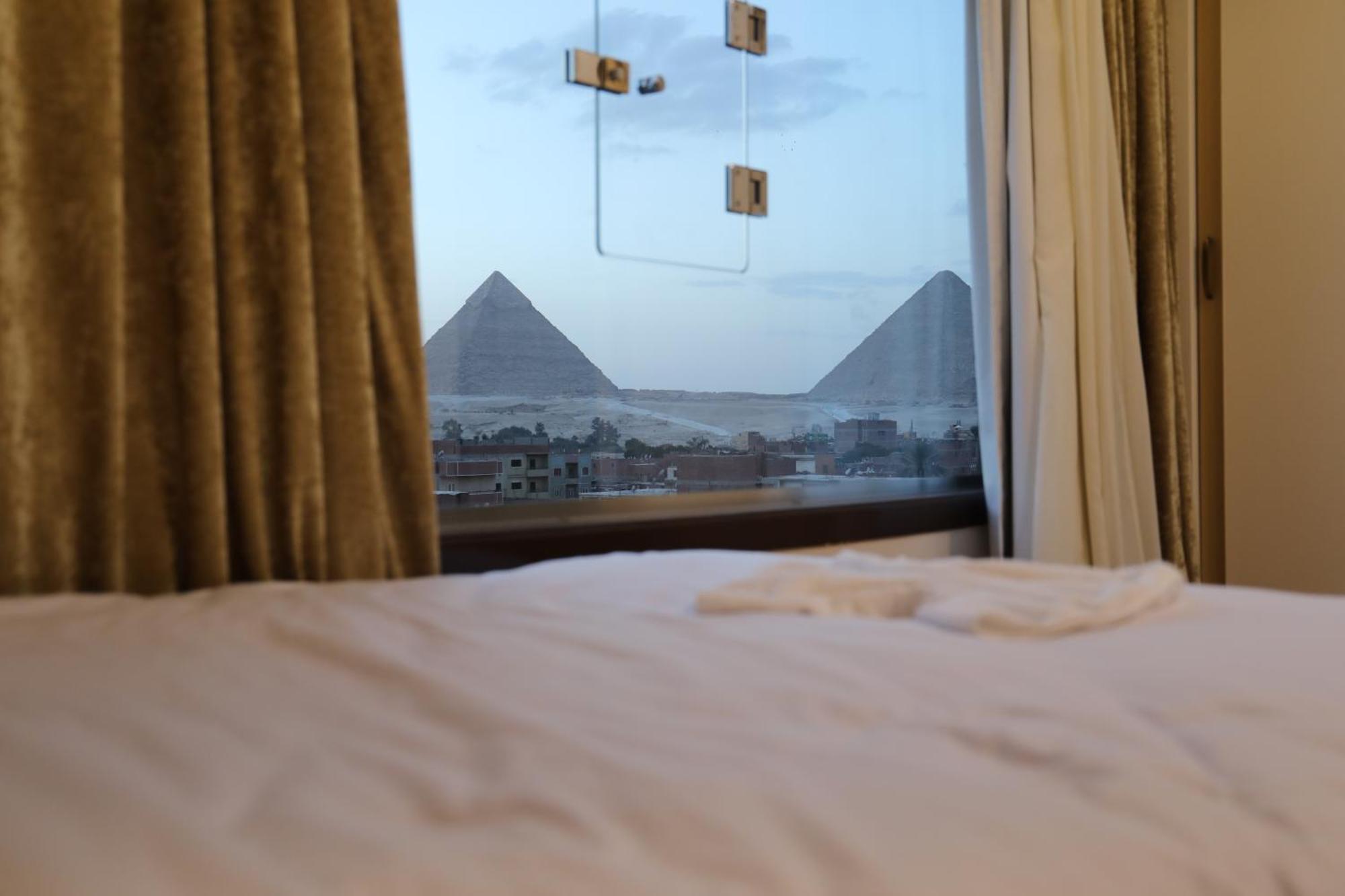 Pyramids Heart Hotel Kafrat al Jabal Bagian luar foto