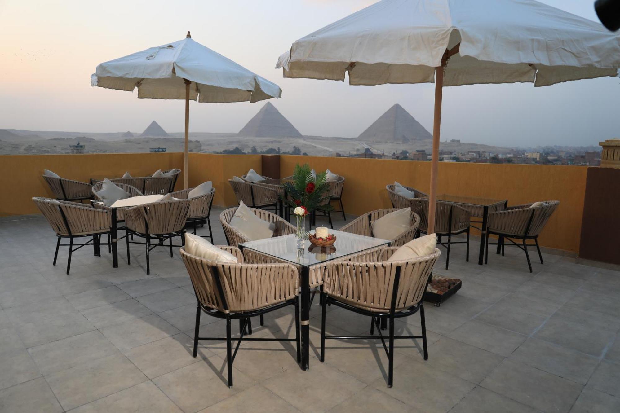 Pyramids Heart Hotel Kafrat al Jabal Bagian luar foto