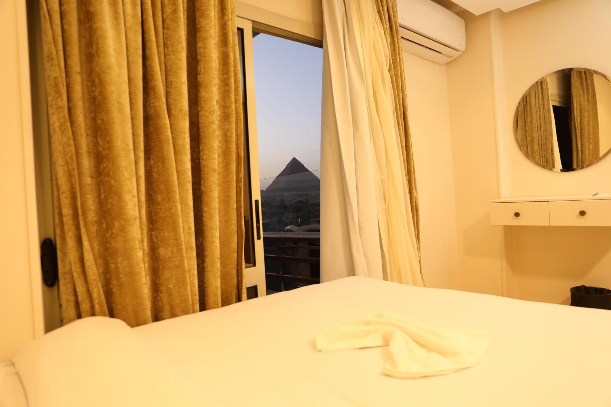 Pyramids Heart Hotel Kafrat al Jabal Bagian luar foto