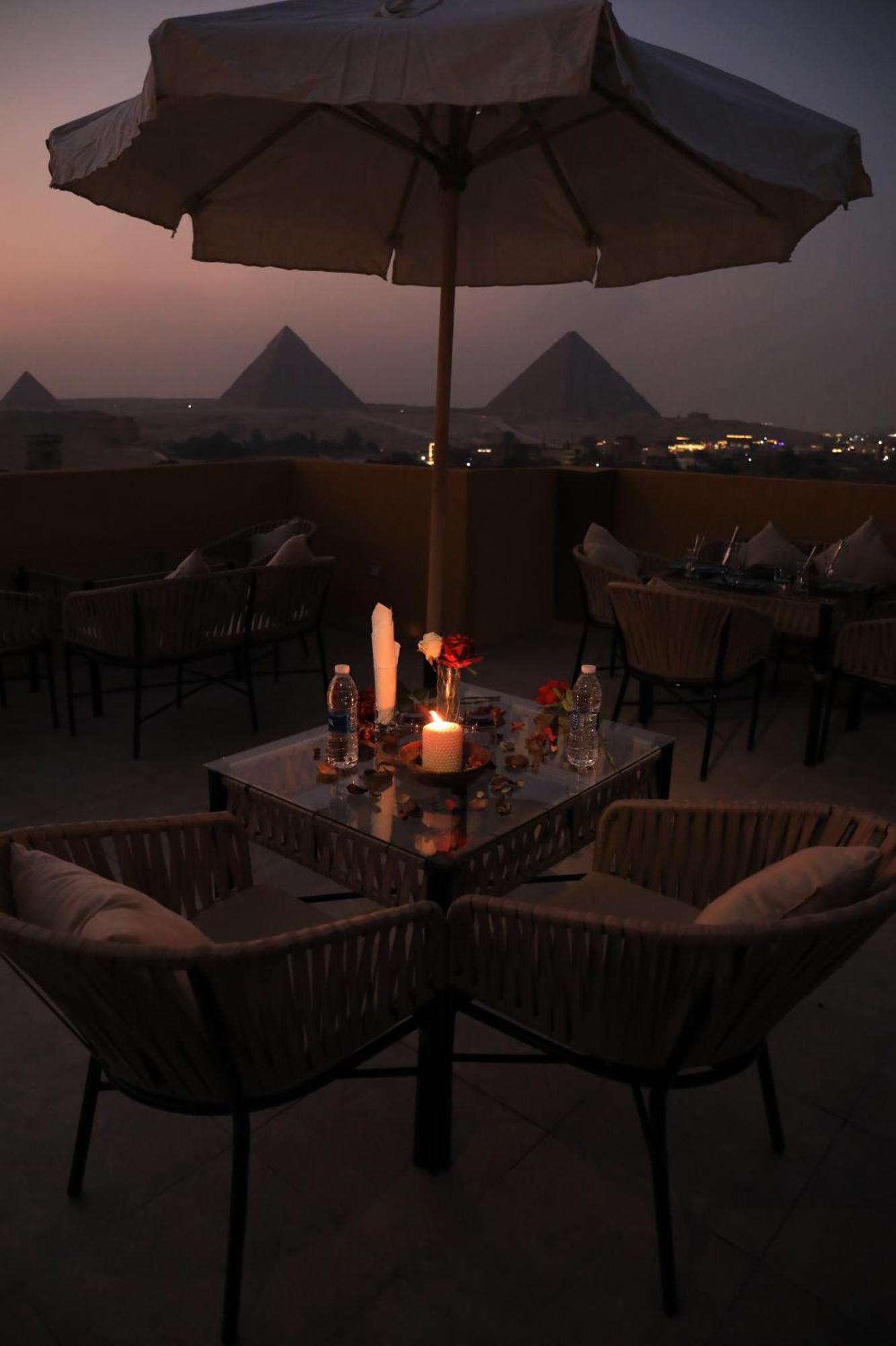Pyramids Heart Hotel Kafrat al Jabal Bagian luar foto