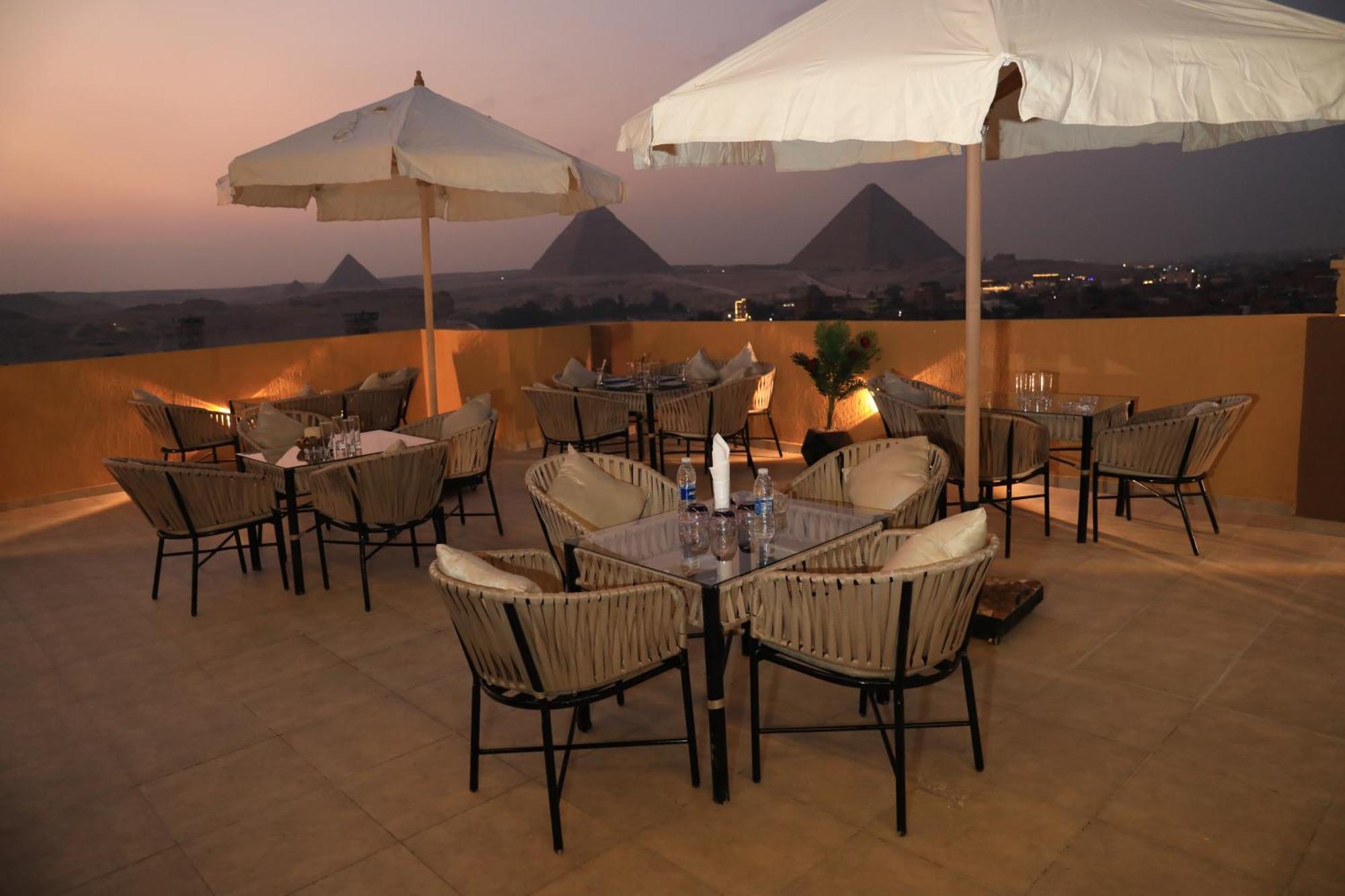 Pyramids Heart Hotel Kafrat al Jabal Bagian luar foto