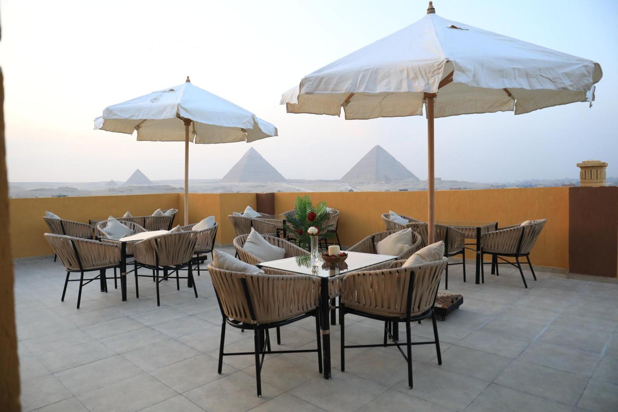 Pyramids Heart Hotel Kafrat al Jabal Bagian luar foto