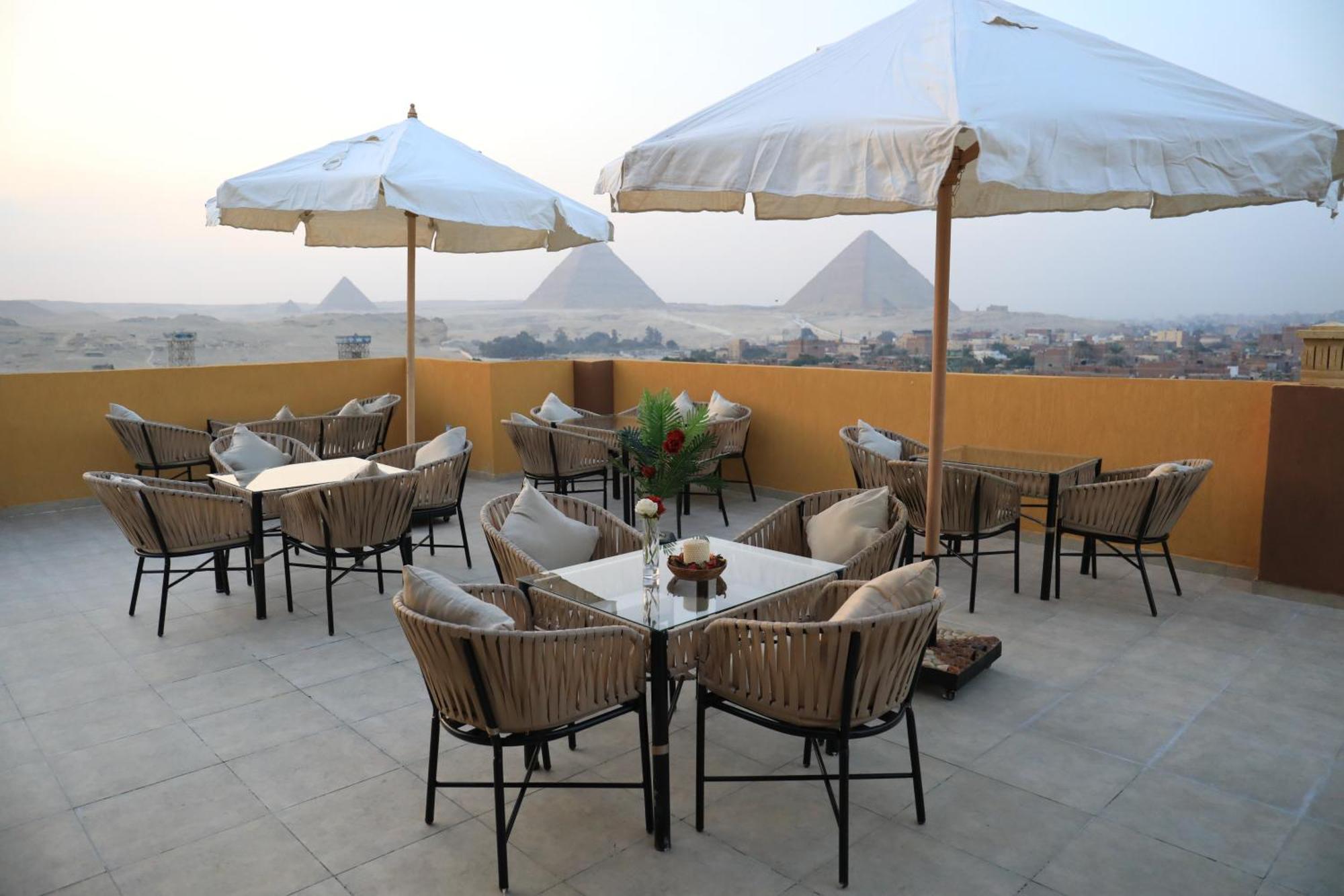 Pyramids Heart Hotel Kafrat al Jabal Bagian luar foto