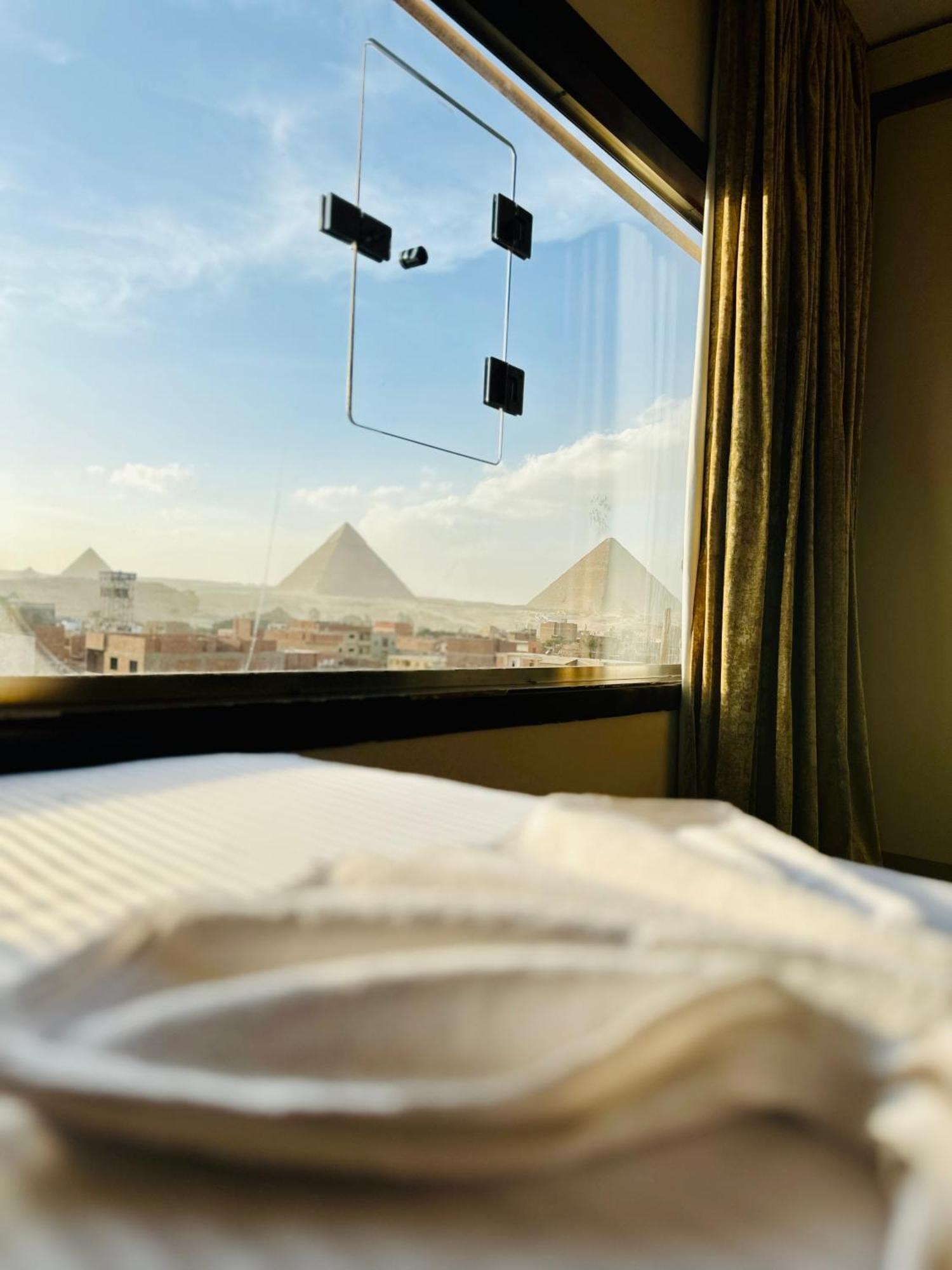 Pyramids Heart Hotel Kafrat al Jabal Bagian luar foto